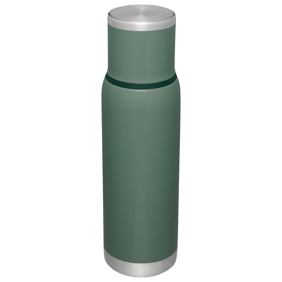 https://www.stanley1913.com/cdn/shop/files/B2B_Web_PNG-The-Adventure-2-0-To-Go-Bottle-1-1QT-1-0L-Hammertone-Green-Hero-Back.png?v=1704425468&width=1080