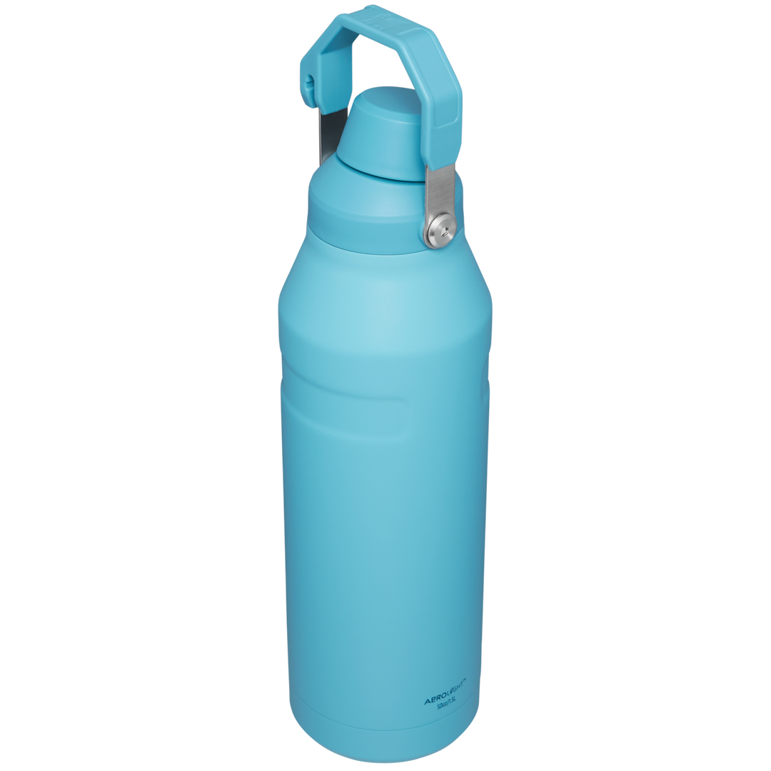 Premium Photo  Cold water in a plastic bottle with a blue cap